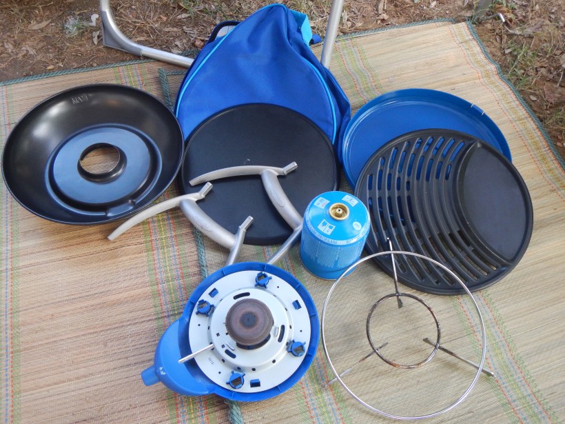 All the BBQ parts. You filled the pan base with water to catch the grease. We made a lot of great chicken dinners on this puppy